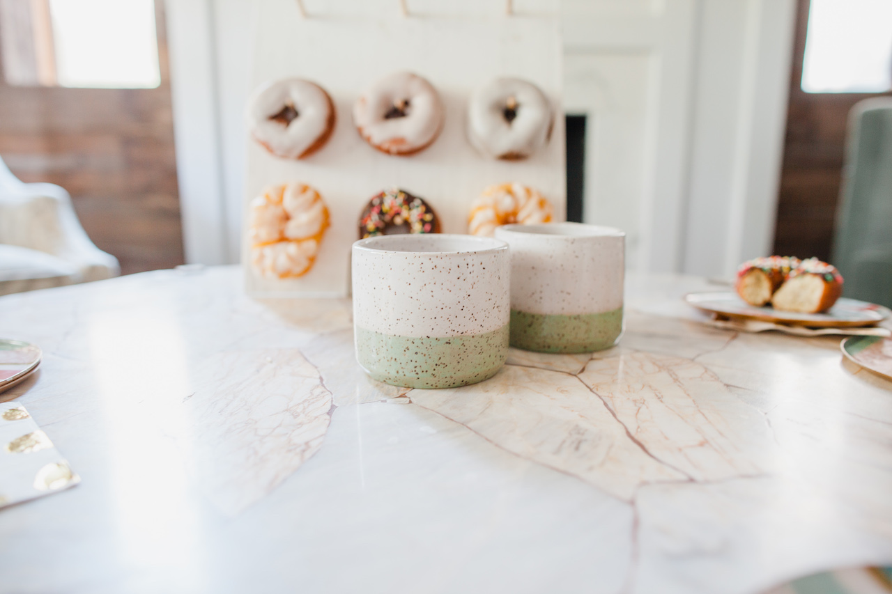 two friends having coffee and donuts